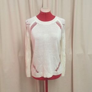 White ripped sweater